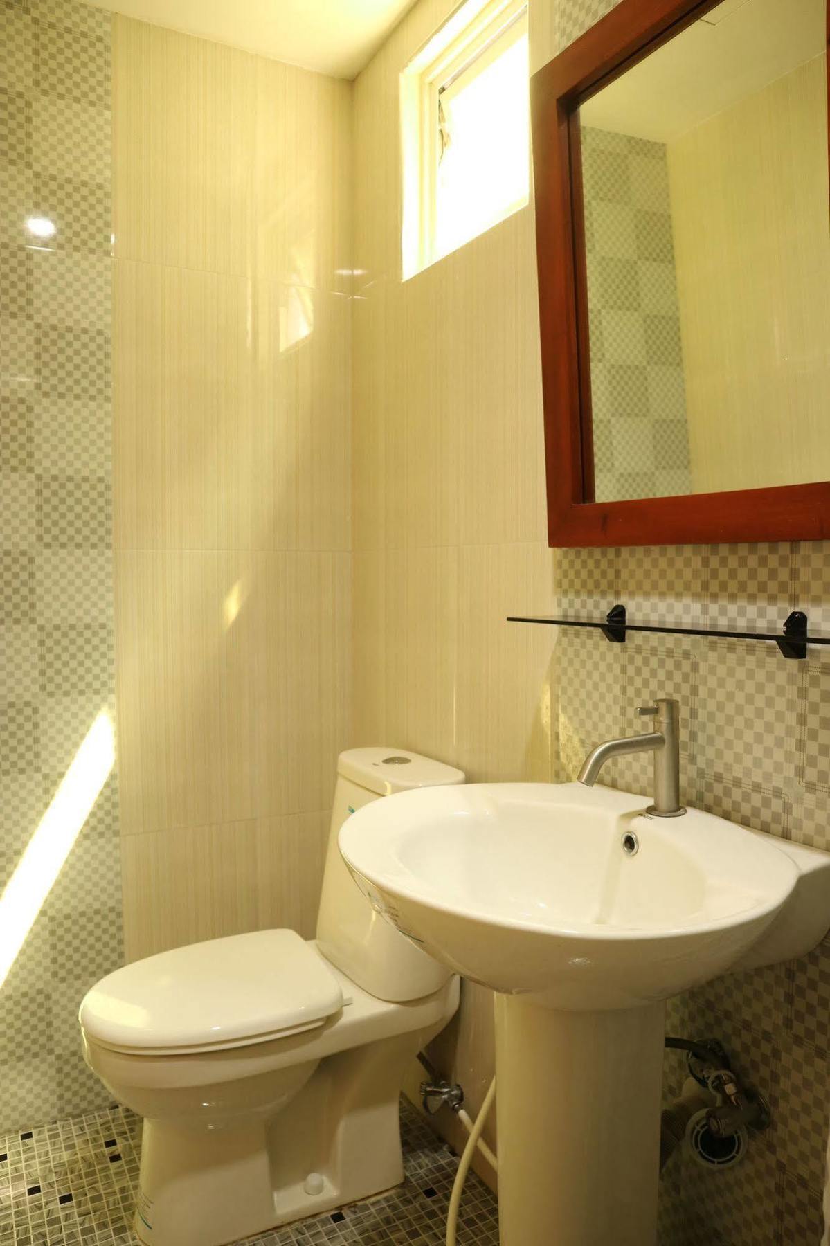 Ea Apartelle - Metro Виган Экстерьер фото