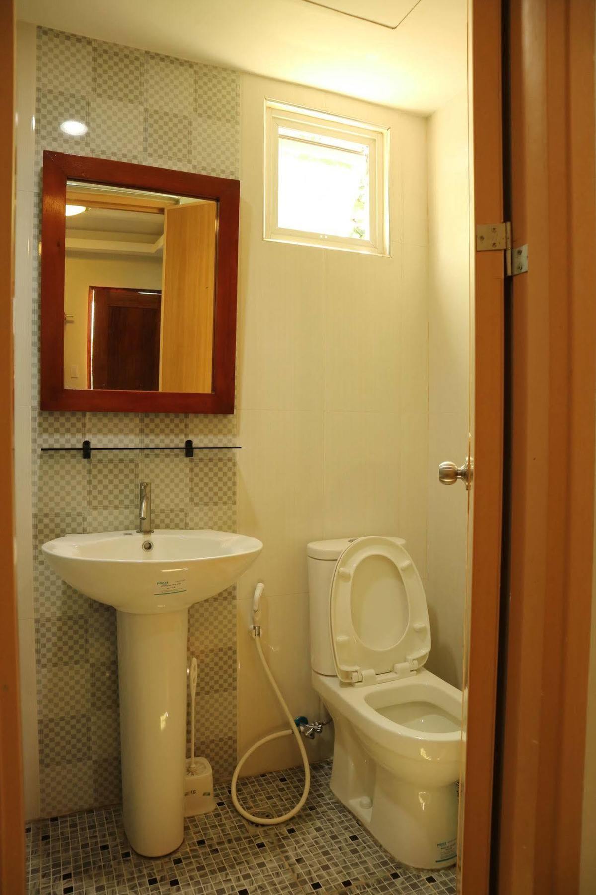 Ea Apartelle - Metro Виган Экстерьер фото