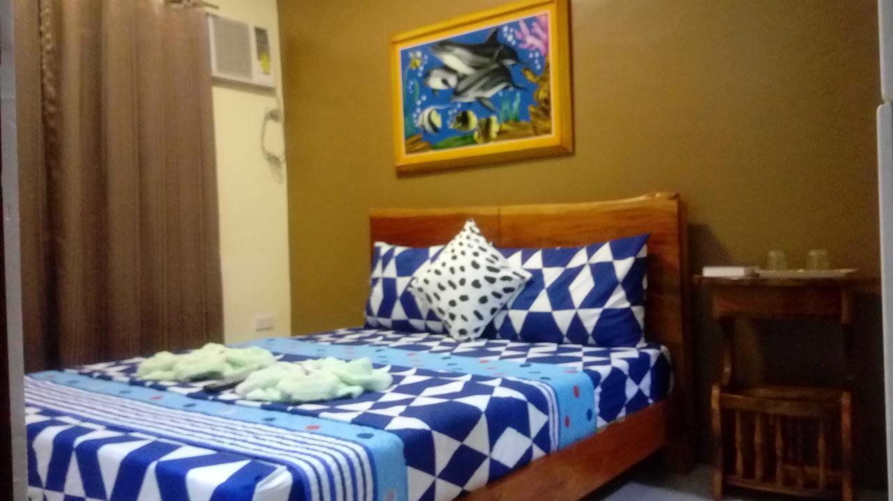 Ea Apartelle - Metro Виган Экстерьер фото